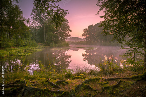 Spring source lake at sunrise photo