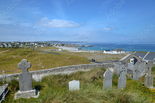 Overlooking the port on Inisheer Island from the graveyard at Caomhan church