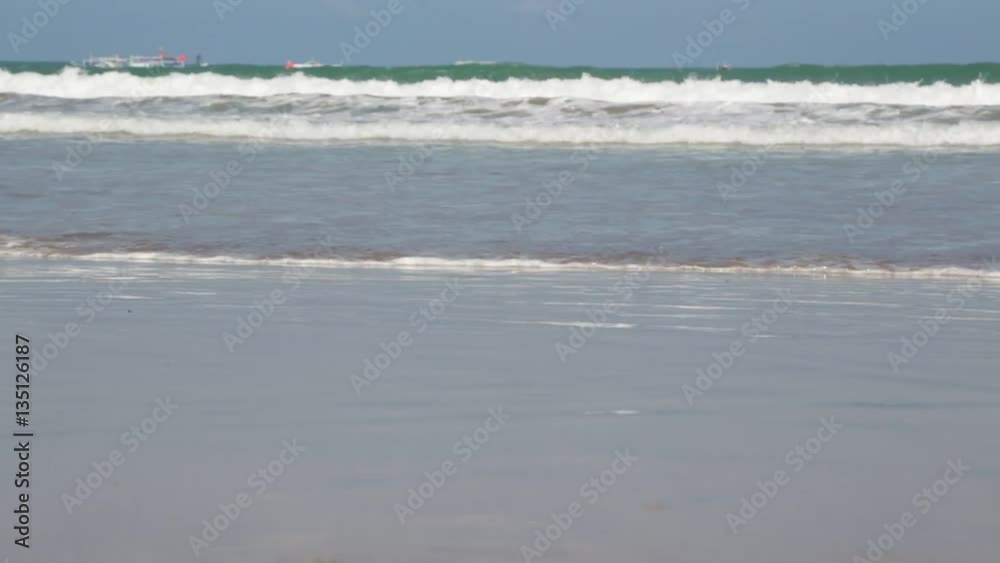 boat in philippines wave of pacific ocean near the sandy beach concept od relax. boat in philippines wave of pacific ocean near the sandy beach concept od relax.