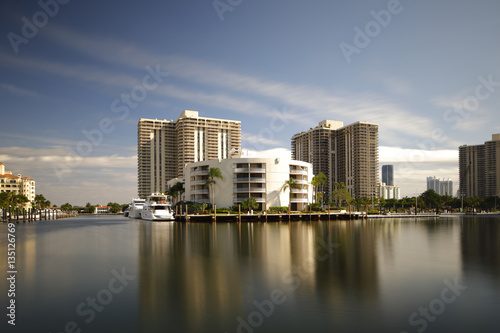 Long exposure image of luxury condos and yachts at Aventura FL  USA