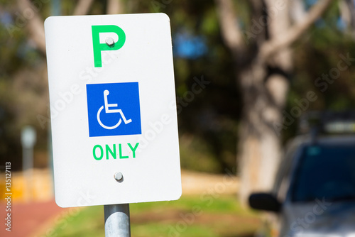 Reserved car parking sign outdoor for disabled photo