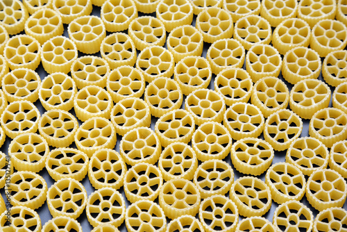 raw dry vermicelli pasta closeup.