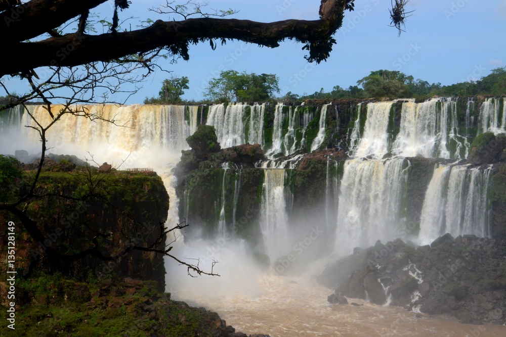 Fototapeta premium Mist at the base of the stunning Iguazu falls from the Argentinian side. 