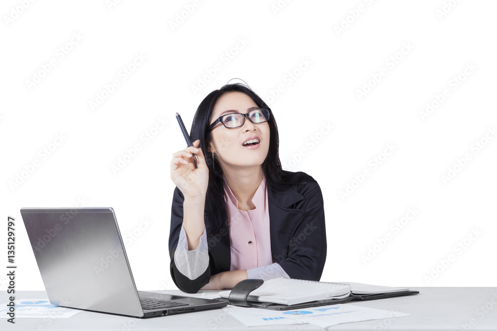 Thoughtful businessman with laptop and paperwork Thoughtful businessman with laptop and paperwork