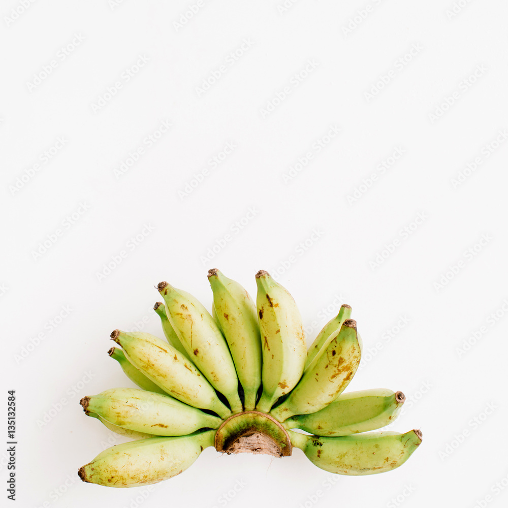 Bunch of bananas isolated. Flat lay, top view. Creative food concept Bunch of bananas isolated. Flat lay, top view. Creative food concept