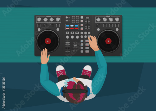 DJ playing vinyl. Top view. DJ Interface workspace mixer console turntables. Night club concept. DJ young man.