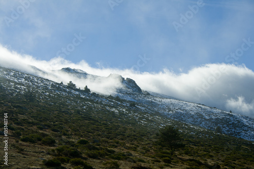 Mountain with clouds and snow