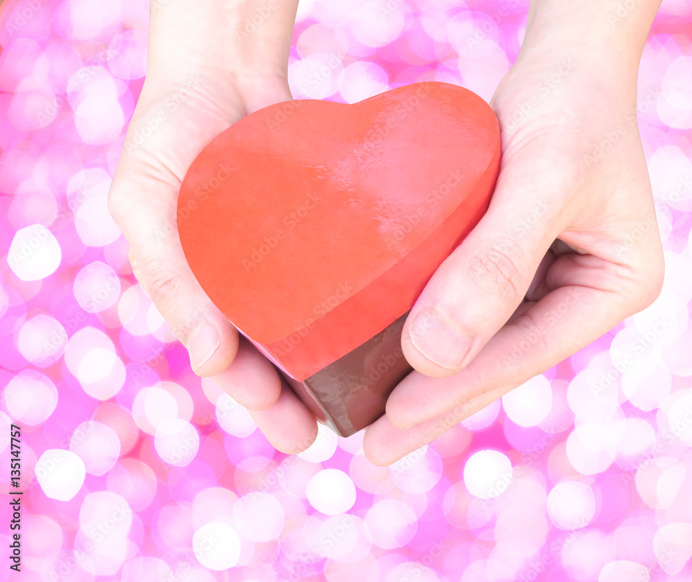 Obraz premium heart gift hand pink illumination