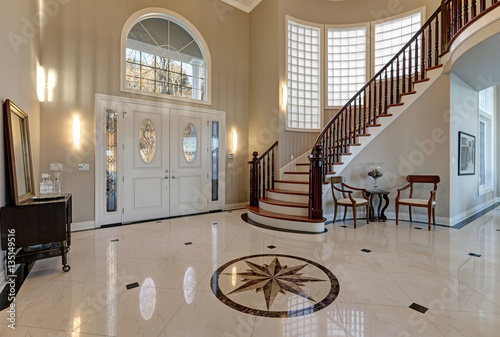 Obraz na płótnie Stunning two story entry foyer with marble mosaic tiled floor