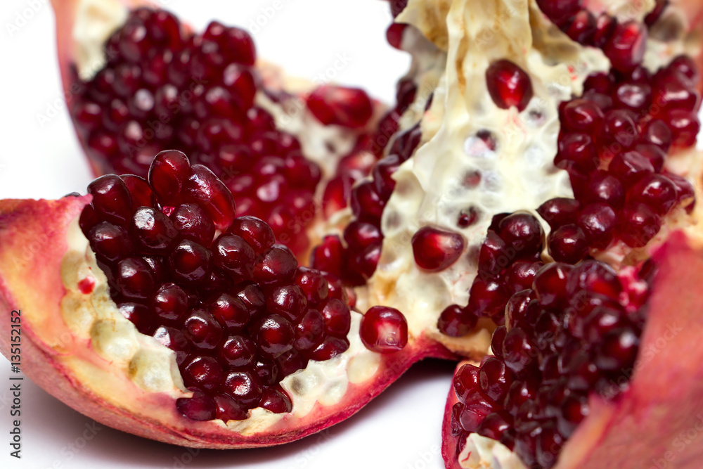 cut pomegranate with seeds cut pomegranate with seeds