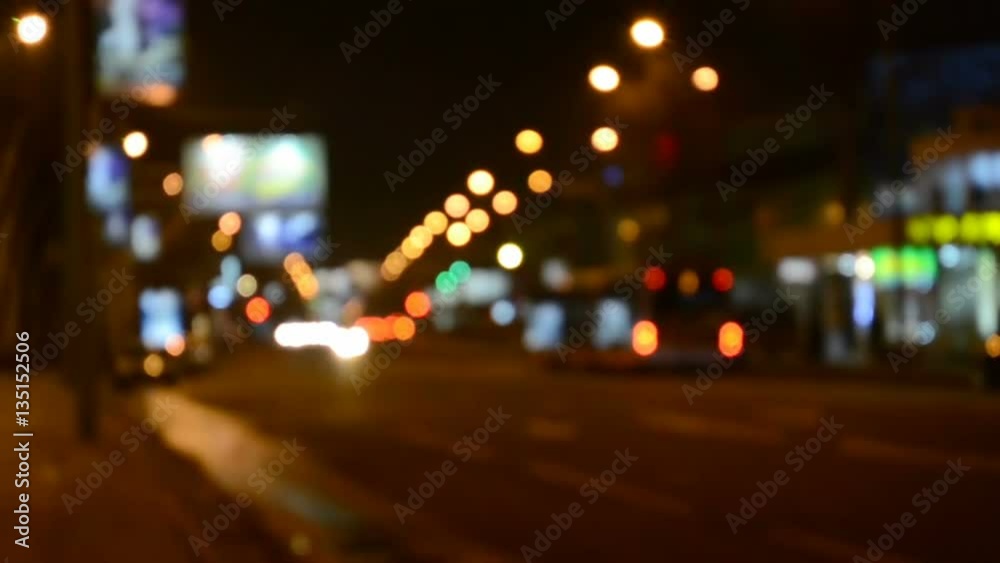 Shooting in the city, night. Car in the city, out of focus. Shooting in the city, night. Car in the city, out of focus.