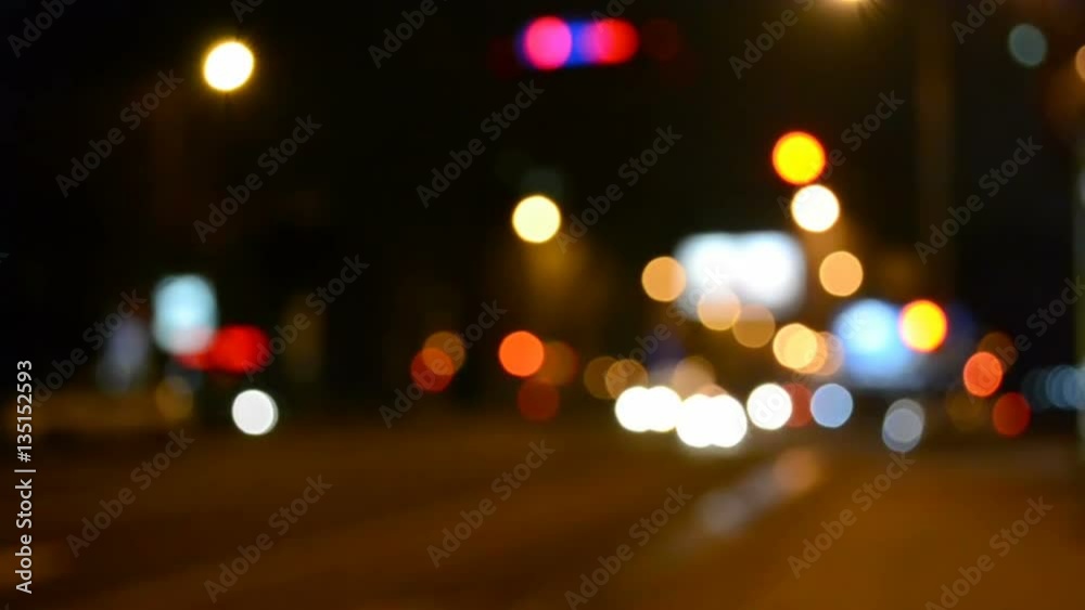 Shooting in the city, night. Car in the city, out of focus. Shooting in the city, night. Car in the city, out of focus.
