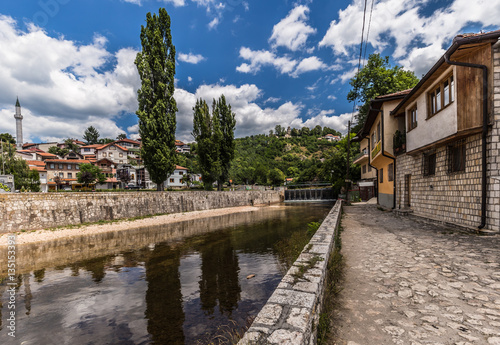 Quadro su tela July 10, 2016: Little canal in the old town of Sarajevo, Bosnia