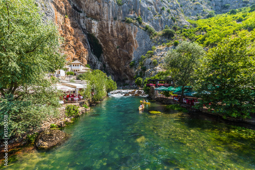 July 12, 2016: The water stream leading to the Dervish house of Blagaj photo