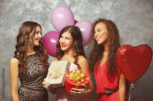 Beautiful young women at bi...