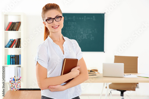 Young teacher at lesson in ...