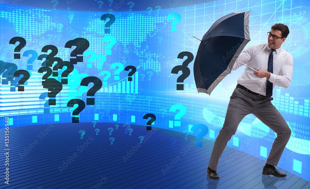 Uncertainty concept with businessman and question marks Uncertainty concept with businessman and question marks