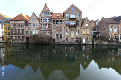 Old buildings along a canal in Ghent, Belgium