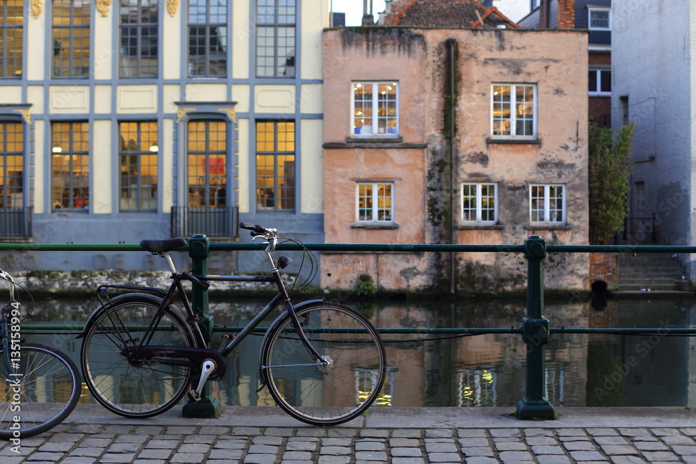 Bicycle parked at the side walk in the city of Ghent, Belgium