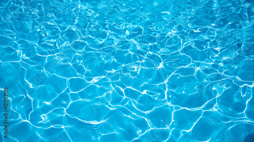 Blue and bright water surface and ripple wave in swimming pool © peangdao