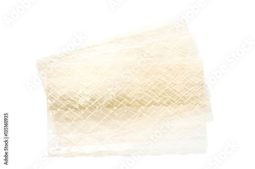 sheet of gelatin leaves on white