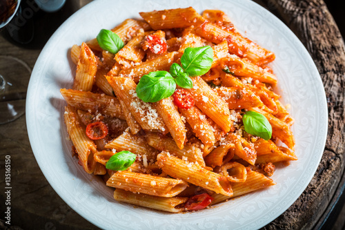 Enjoy your pasta bolognese with parmesan and basil
