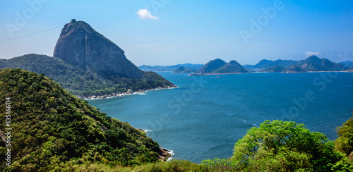 View of Sugarloaf Mountain from Forte do Leme. Sugarloaf peak situated at the mouth of Guanabara Bay on a peninsula that juts out into the Atlantic Ocean, Rio de Janeiro, Brazil photo