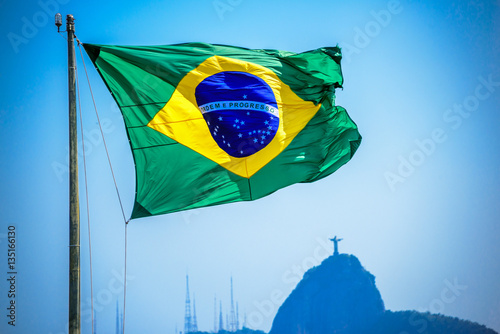 Brazilian Flag On The Background Of Christ The Redeemer Art Deco Statue Of Jesus Christ In Rio De Janeiro Brazil Stock Photo Adobe Stock