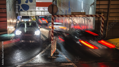Queue of  cars at entrance of shopping mall parking