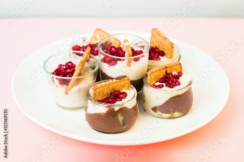 Cups with chocolate and vanilla mousse