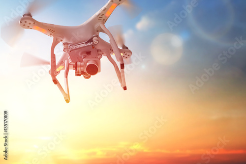 drone in the  sunset sky