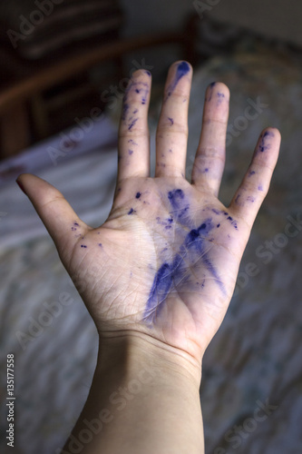 Hands stained in ink