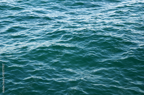 Blue sea surface with waves © Alekss