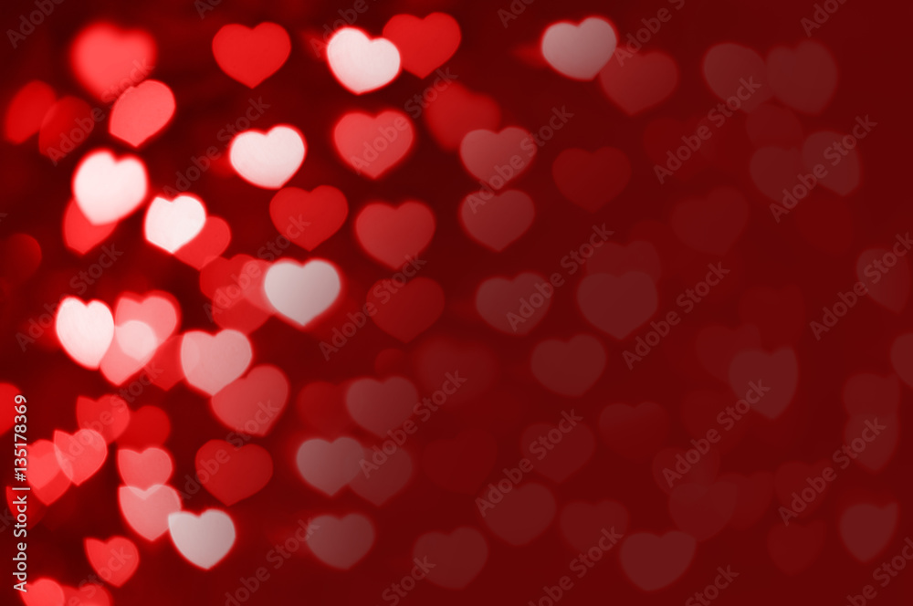 Red and white hearts bokeh as background with copy space Red and white hearts bokeh as background with copy space
