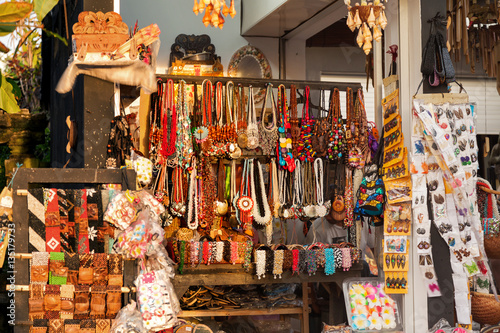 Shop with souvenirs for tourists. Many accessories, magnets and decorations. Bali. Indonesia. photo