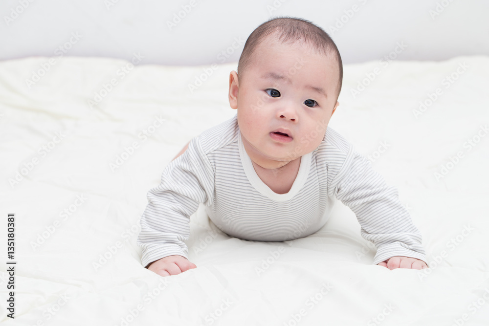 Portrait of thinking baby boy