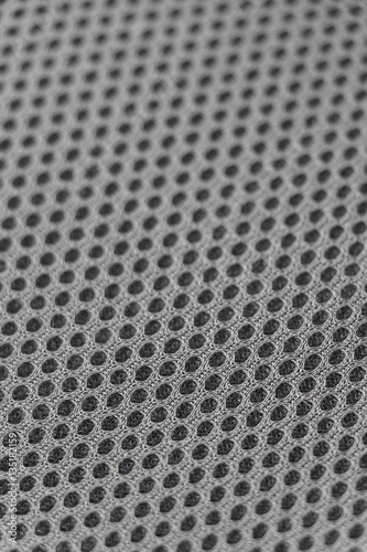 Gray mesh background, small depth of field