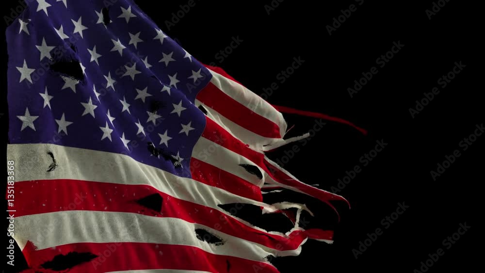 American torn and tattered flag waves in the wind. (Looped, with alpha channel)