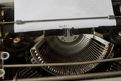 Sale typed words on Vintage Typewriter