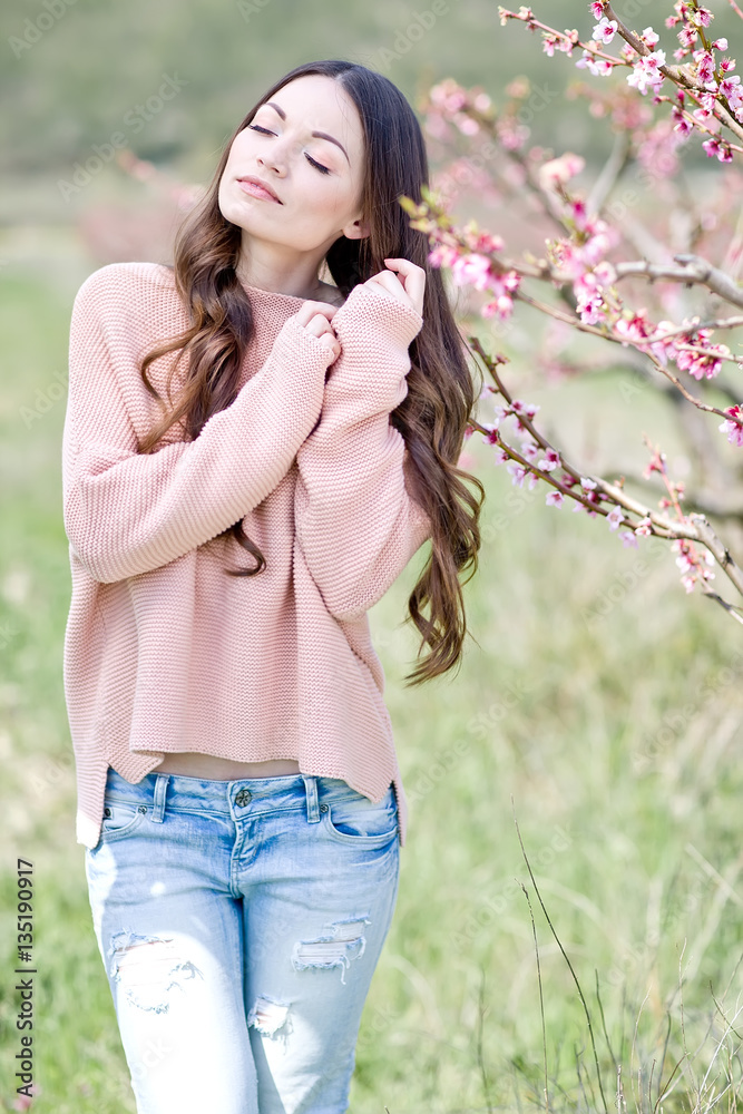 Beautiful woman in a spring garden Beautiful woman in a spring garden