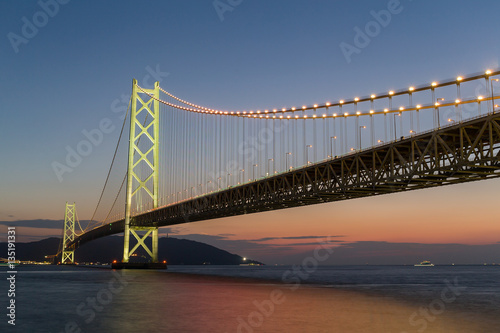 Fototapeta Naklejka Na Ścianę i Meble -  Akashi Kaikyo Bridge at sunset