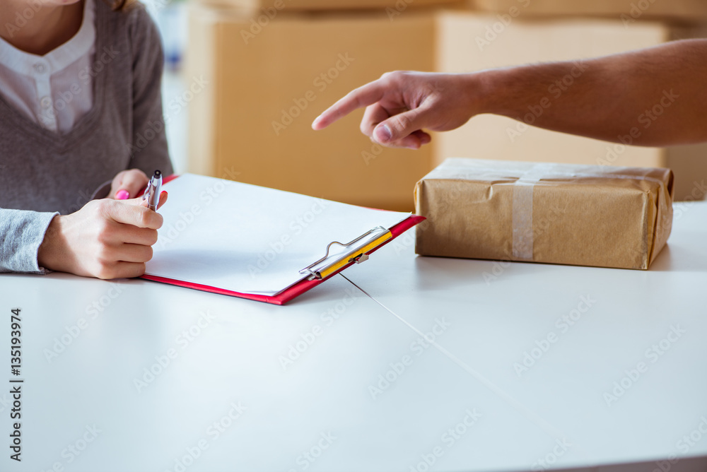Delivery man delivering parcel box Delivery man delivering parcel box