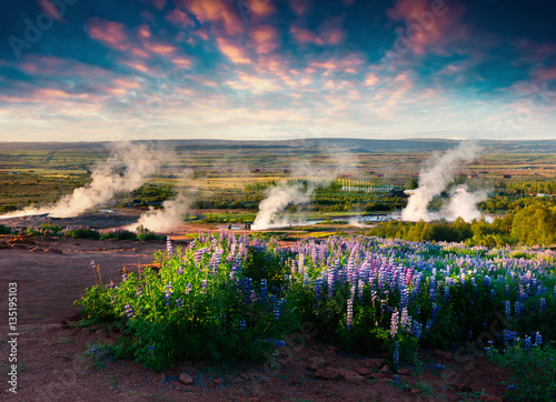 Erupting of the Great Geysir lies in Haukadalur valley photo