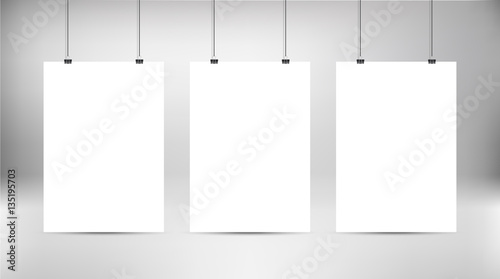 Empty white vector poster templates. Poster mock up. Template of three white blank vector posters. Set of mockups hanging on wall. Frame for paper sheet. Stock vector. 