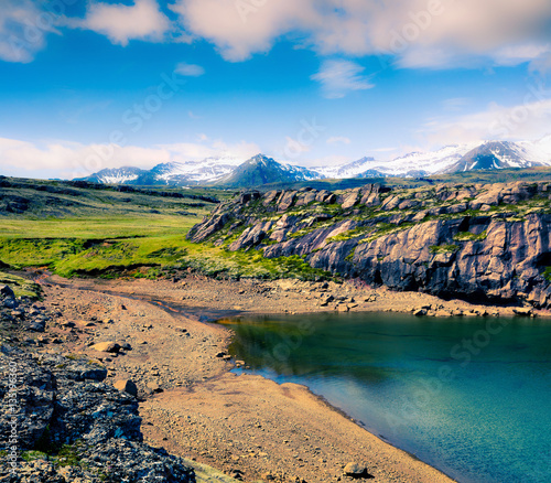 Typical Icelendic landscape with volcanic cround and pure water photo