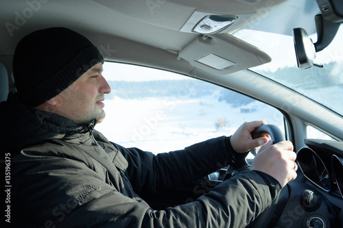 The driver driving on snowy roads