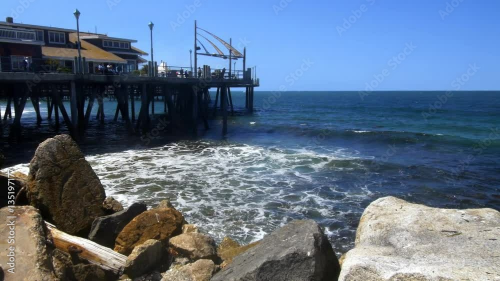 Redondo Beach International boardwalk ends with a pier structure housed with restaurants and ocean view seating to watch the waves roll to shore. Redondo Beach International boardwalk ends with a pier structure housed with restaurants and ocean view seating to watch the waves roll to shore.
