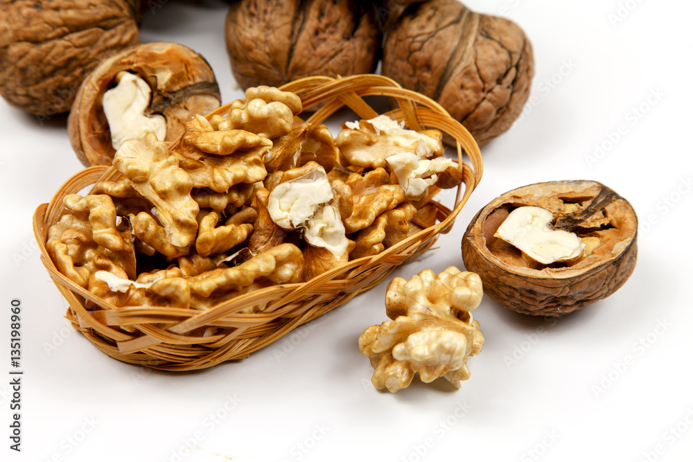 Whole walnuts and kernels on the table Whole walnuts and kernels on the table