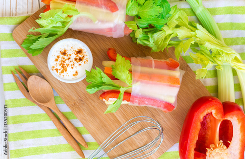 Spring roll with vegetables and white sour cream souce photo