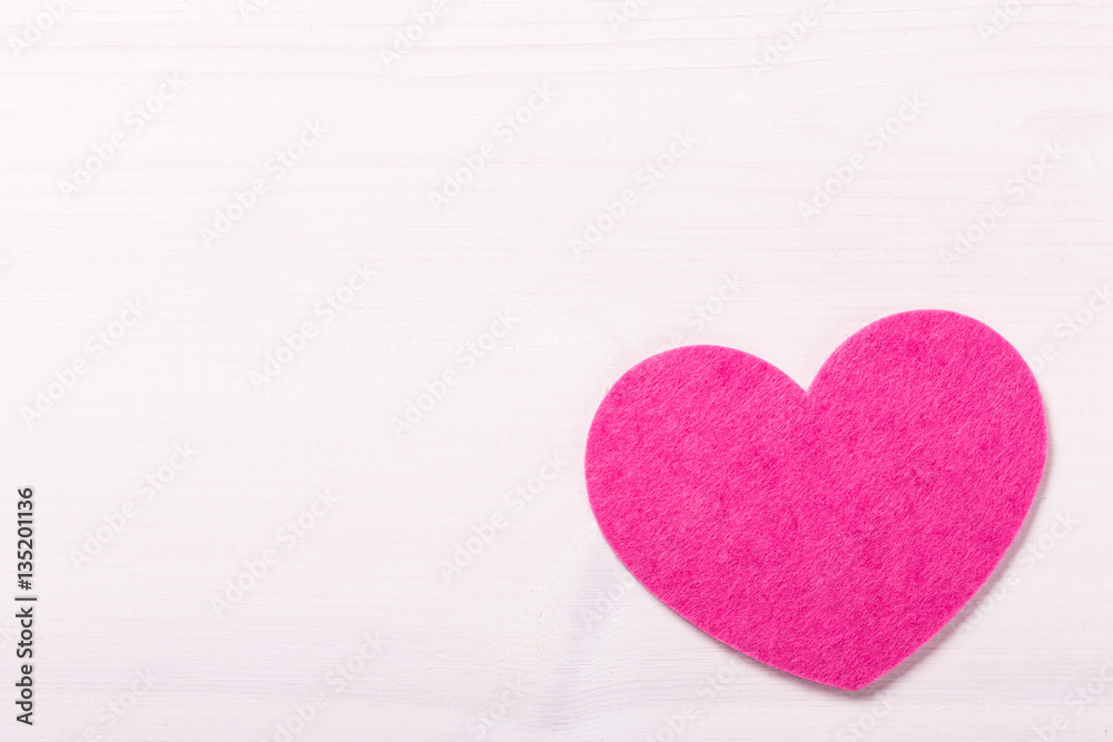 Heart shape on white wooden table